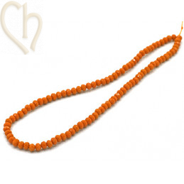 Round flattened facetted glasbead 6*4mm color Ocher