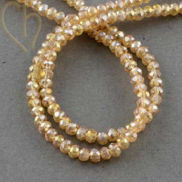 Ronde aplatie facettées 3x2mm couleur Lt. Colorado Topaz AB