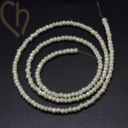 Round flattened facetted glasbead 3x2mm color HoneyDew