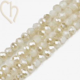 Ronde aplatie facettées 3x2mm couleur Creamy White