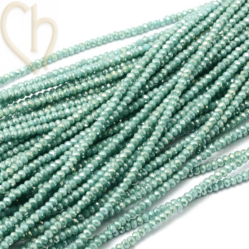 Round flattened facetted glasbead 3x2mm color Aquamarine