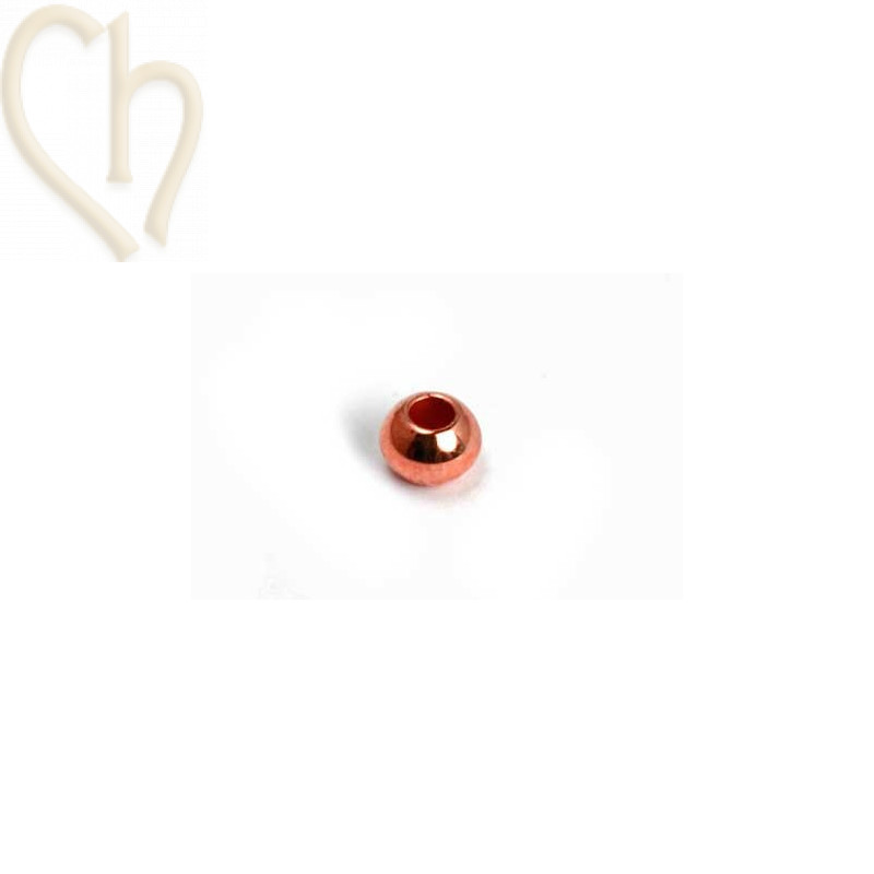 boule metal 3*2mm trou 1.3mm or rose